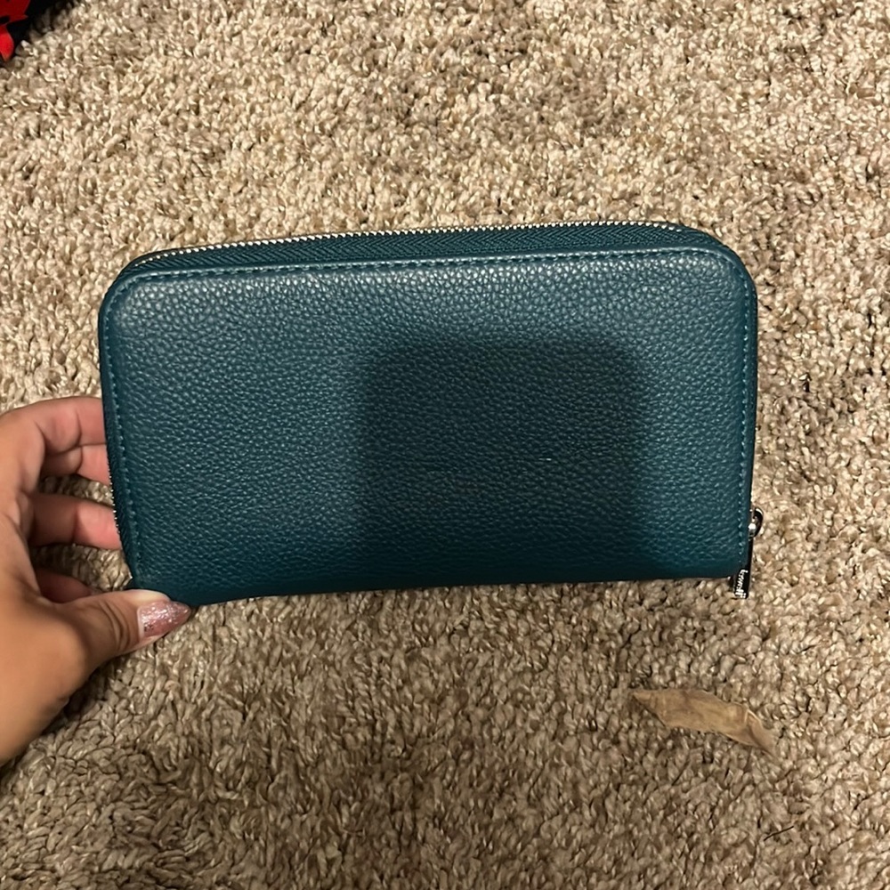 Thirty-one All about the Benjamins wallet.